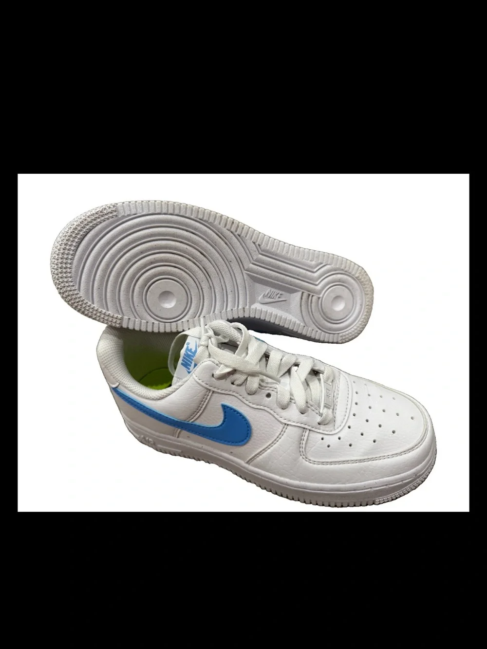 Nike White Low-Top Sneakers with Blue Swoosh Accent